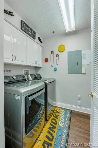 a stove top oven a sink and a table with chairs