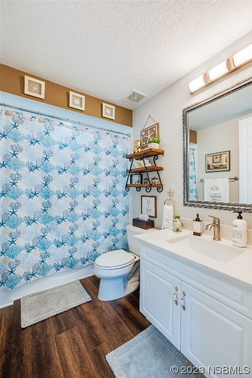 4620 Riverwalk Village Court, Unit 7206 Ponce Inlet, FL 32127 - Photo 6 of 48 a bathroom with a sink mirror vanity and toilet