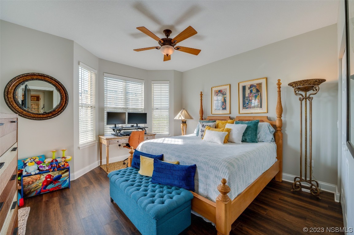 4620 Riverwalk Village Court, Unit 7206 Ponce Inlet, FL 32127 - Photo 7 of 48 a bed room with a bed and a couch