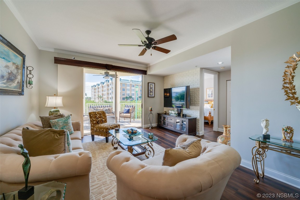 4620 Riverwalk Village Court, Unit 7206 Ponce Inlet, FL 32127 - Photo 10 of 48 a living room with furniture and a large window