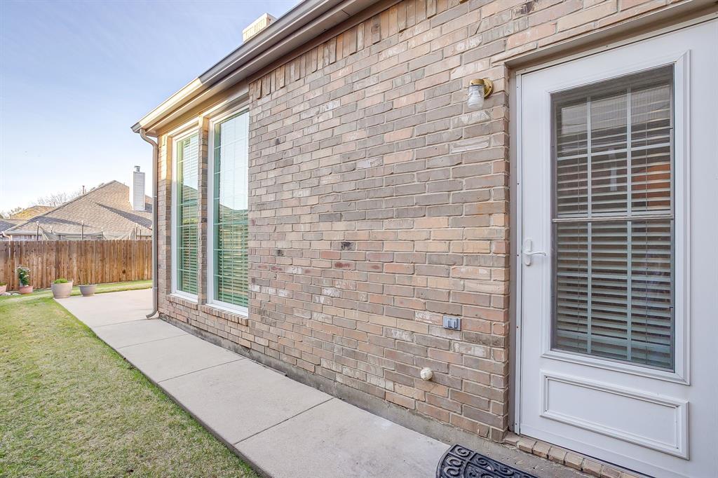8105 Hosta Way Fort Worth, TX 76123 - Photo 28 of 33 a view of a house with backyard and porch