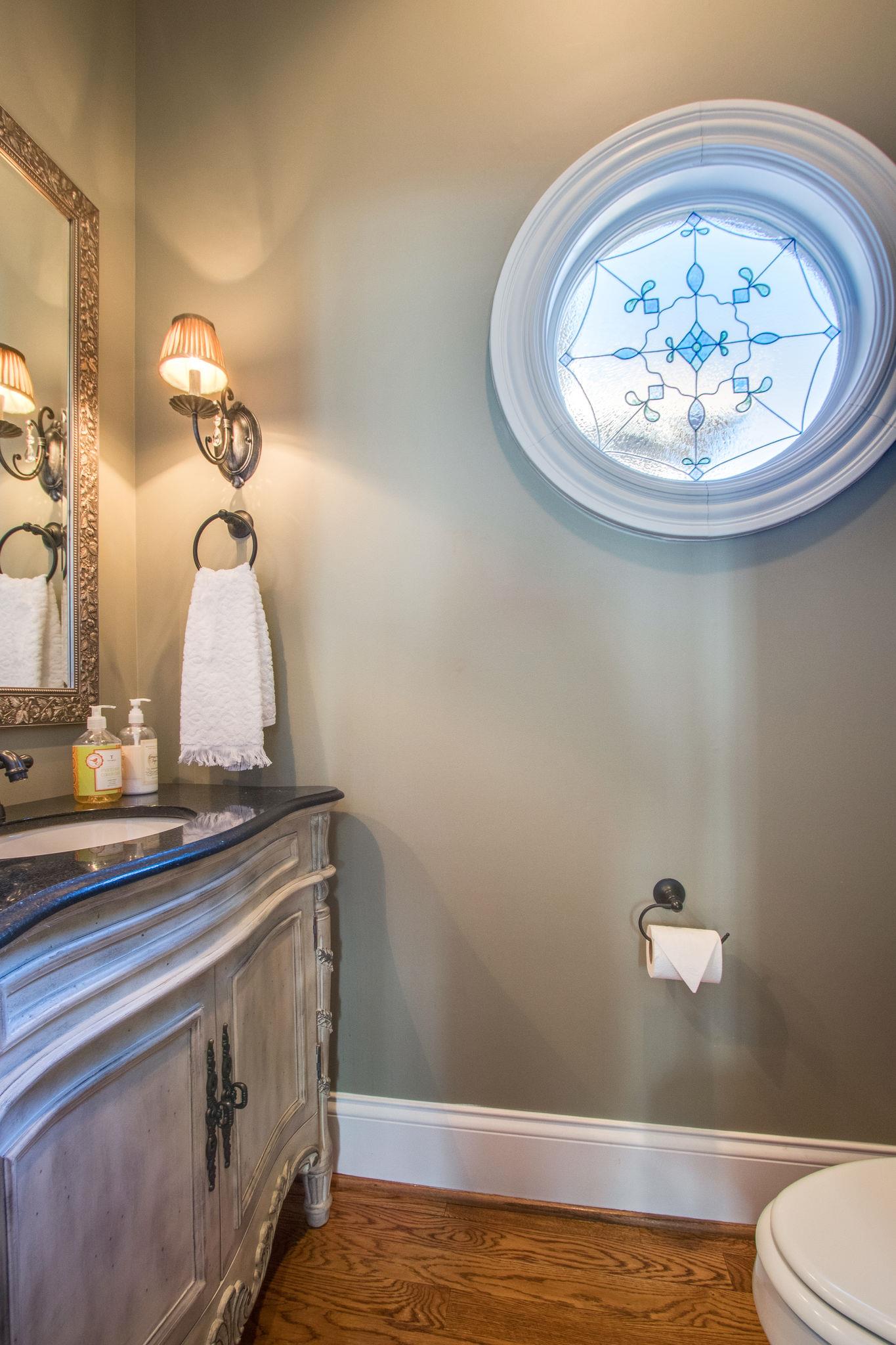 413 Sandcastle Road Franklin, TN 37069 - Photo 10 of 29 The half bath is just down the hall from the kitchen