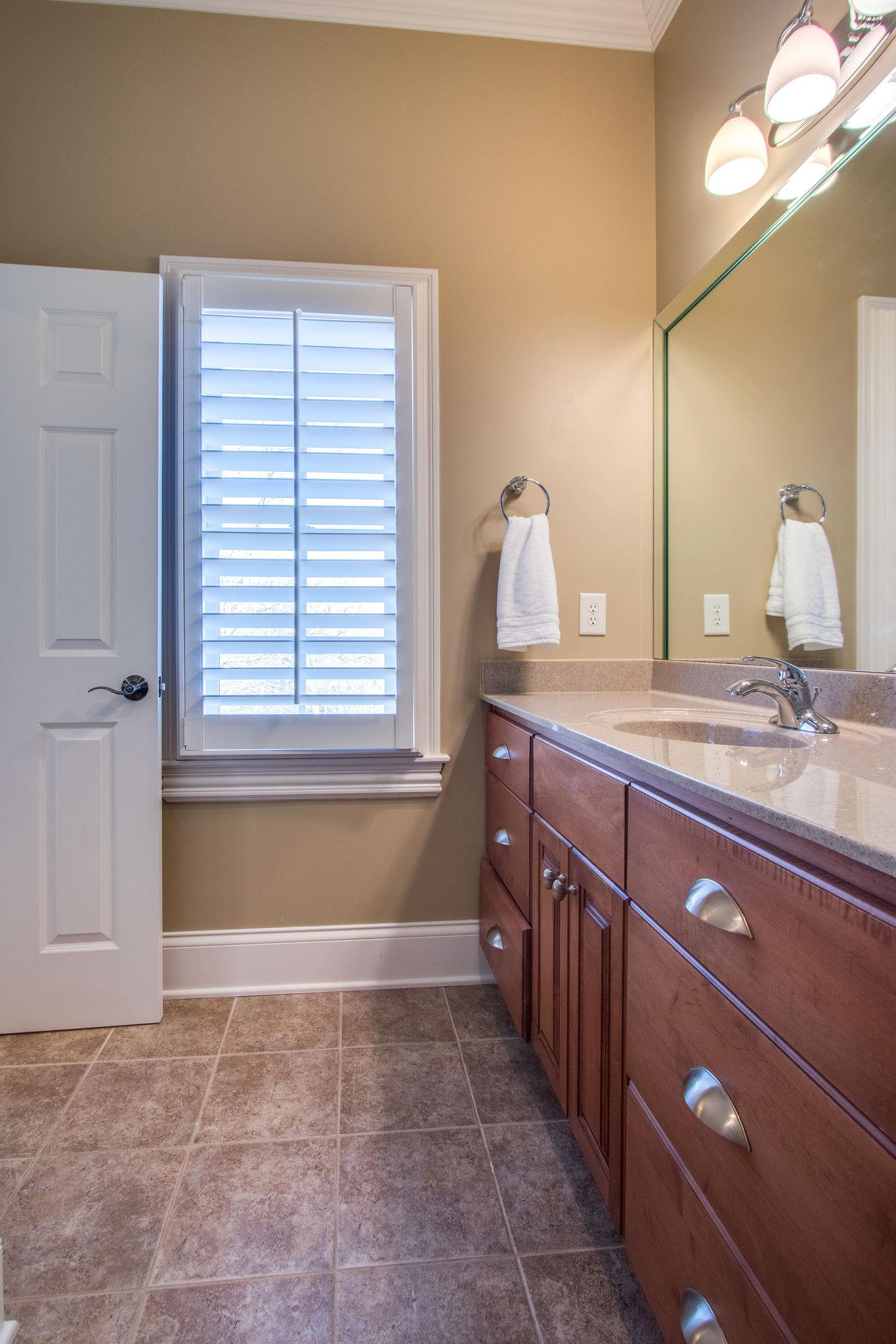 413 Sandcastle Road Franklin, TN 37069 - Photo 17 of 29 All secondary bedrooms on the main floor has it's own en suite bath.