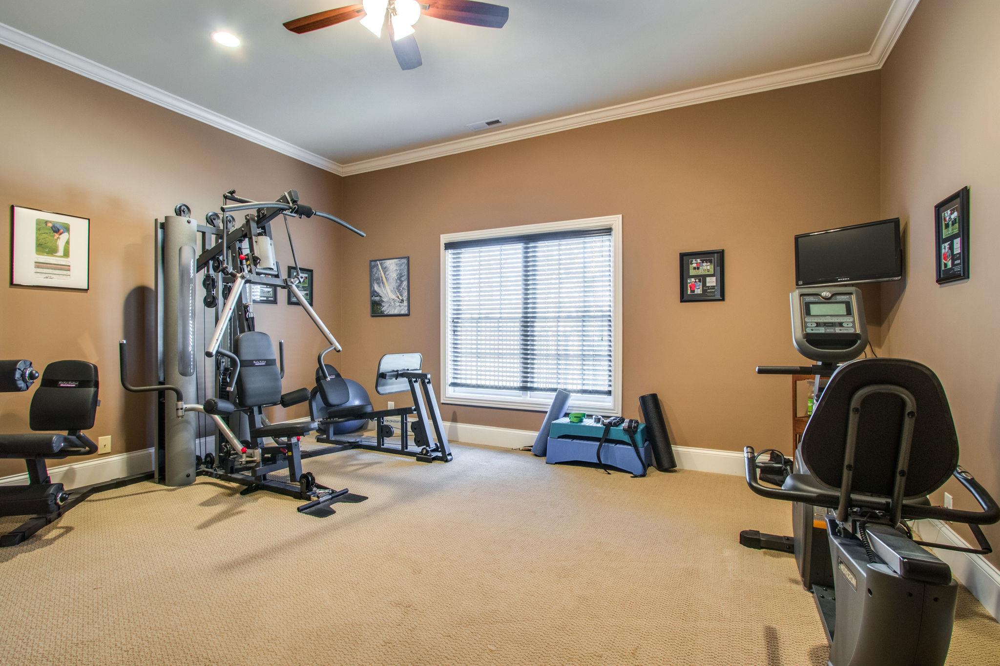 413 Sandcastle Road Franklin, TN 37069 - Photo 21 of 29 There's an additional room just off the den that is currently a fitness room