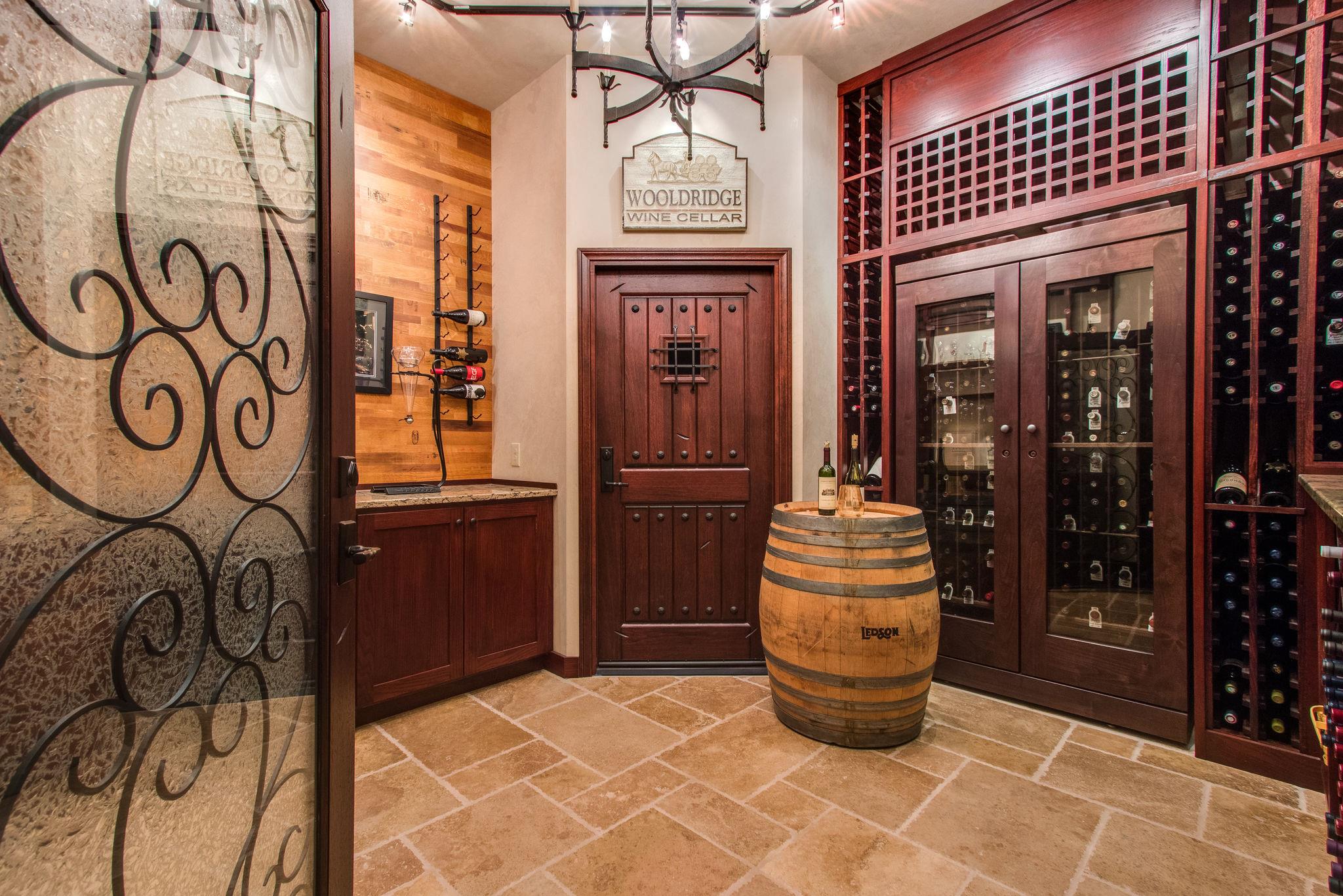 413 Sandcastle Road Franklin, TN 37069 - Photo 23 of 29 If you're a wine lover, you'll have plenty of room for your collection in this custom built wine room. There's an additional storage room just behind that door.
