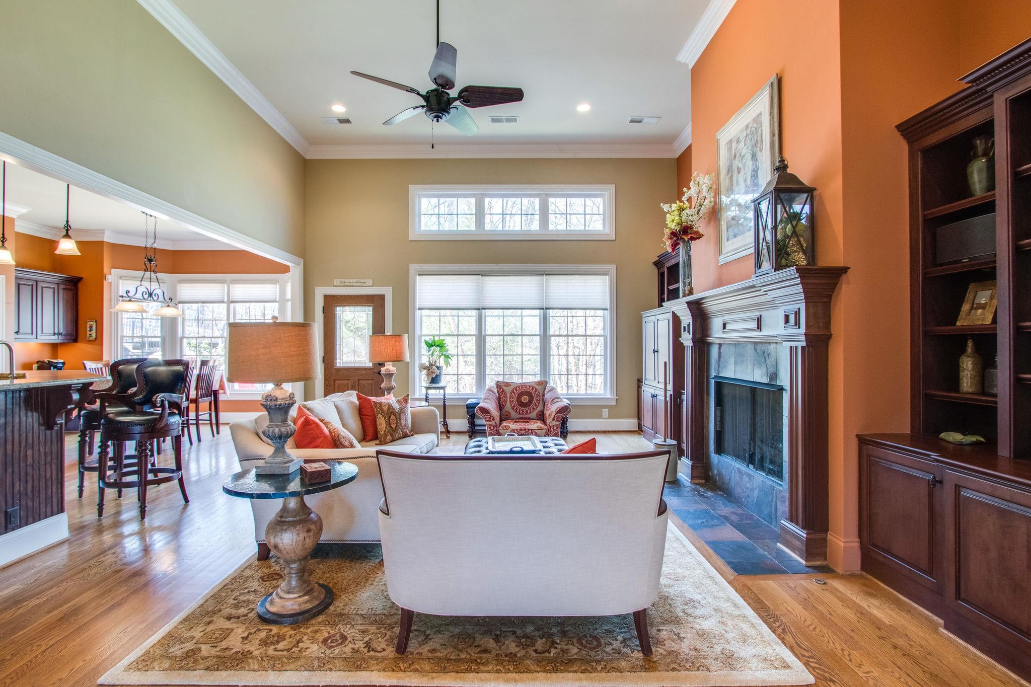 413 Sandcastle Road Franklin, TN 37069 - Photo 5 of 29 The formal living area is elegantly casual with a gas fireplace and lots of windows to flood the space with light and give you a view of the picturesque back yard.