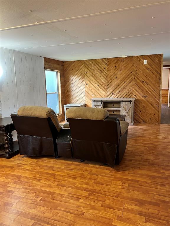 2334 San Bar Road, Unit 46 Graford, TX 76449 - Photo 11 of 37 a room with a bed and a flat tv screen