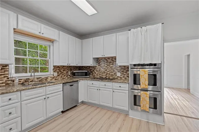 $545,000 | 4719 Brownstone Drive, Peachtree Corners, GA 30096