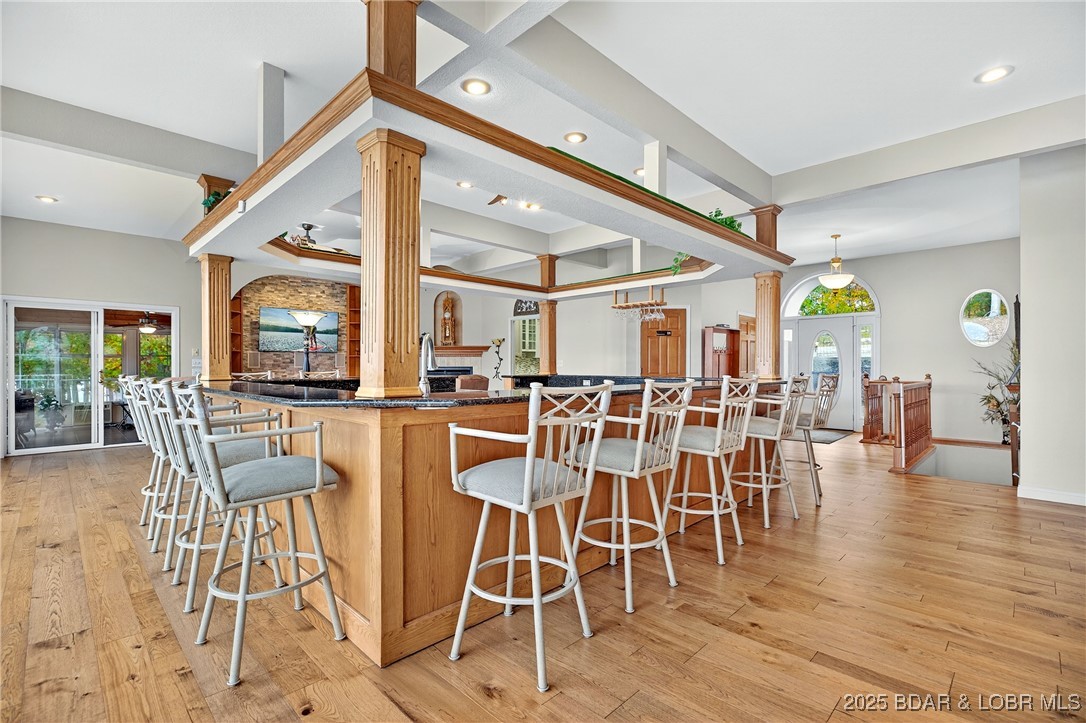 331 Hollow Oak Road Sunrise Beach, MO 65079 - Photo 11 of 67 Kitchen to sunroom, living room, & entry