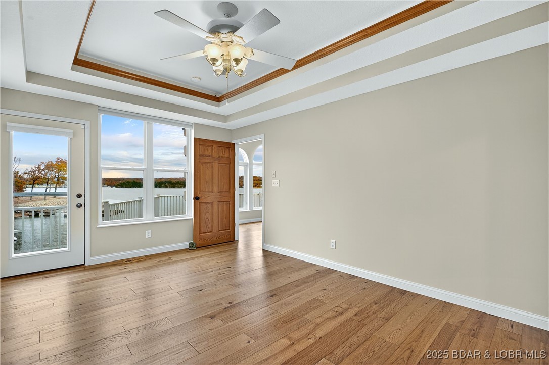 331 Hollow Oak Road Sunrise Beach, MO 65079 - Photo 27 of 67 Primary Suite w/ deck access