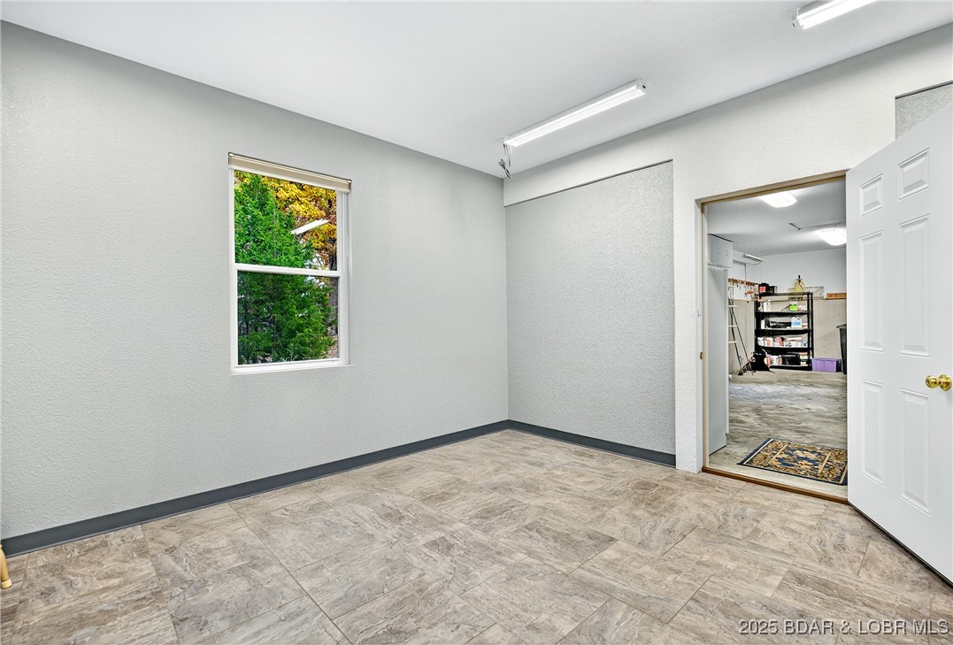 331 Hollow Oak Road Sunrise Beach, MO 65079 - Photo 40 of 67 Storage off of garage