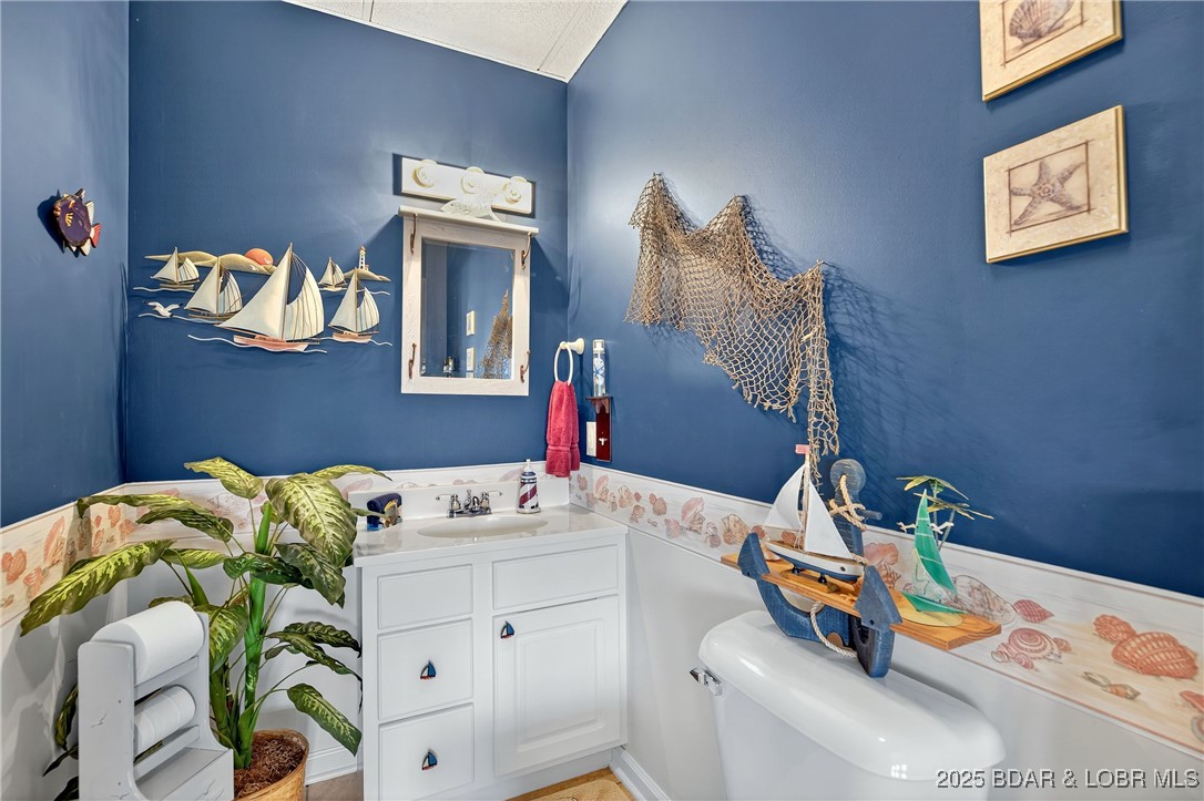 331 Hollow Oak Road Sunrise Beach, MO 65079 - Photo 46 of 67 Lower Level Half Bath