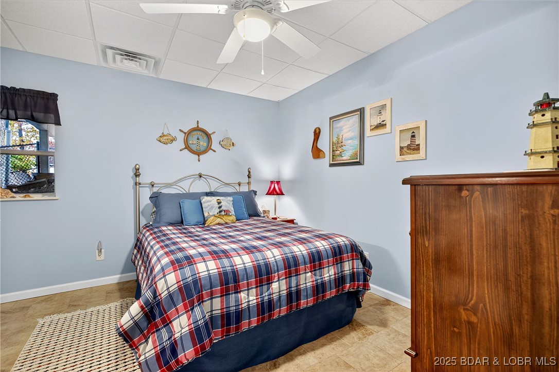 331 Hollow Oak Road Sunrise Beach, MO 65079 - Photo 53 of 67 Bedroom 3 w/ en-suite