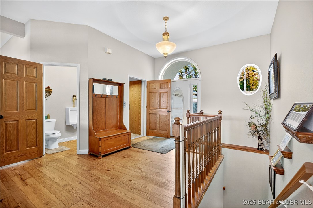 331 Hollow Oak Road Sunrise Beach, MO 65079 - Photo 9 of 67 Main level entry -- half bath, elevator access, &