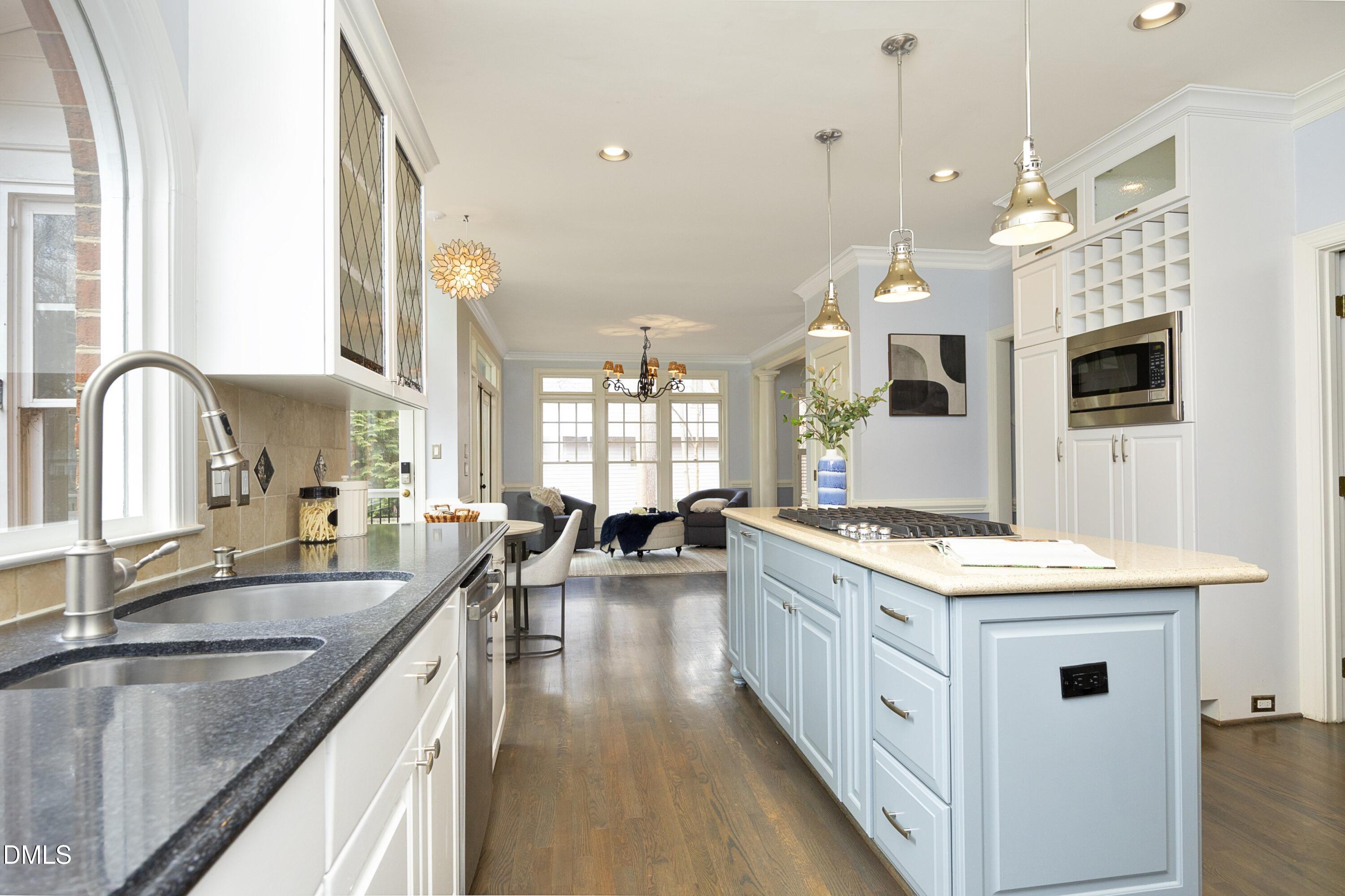 10728 Winding Wood Trail Raleigh, NC 27613 - Photo 16 of 54 a kitchen with lots of counter top space