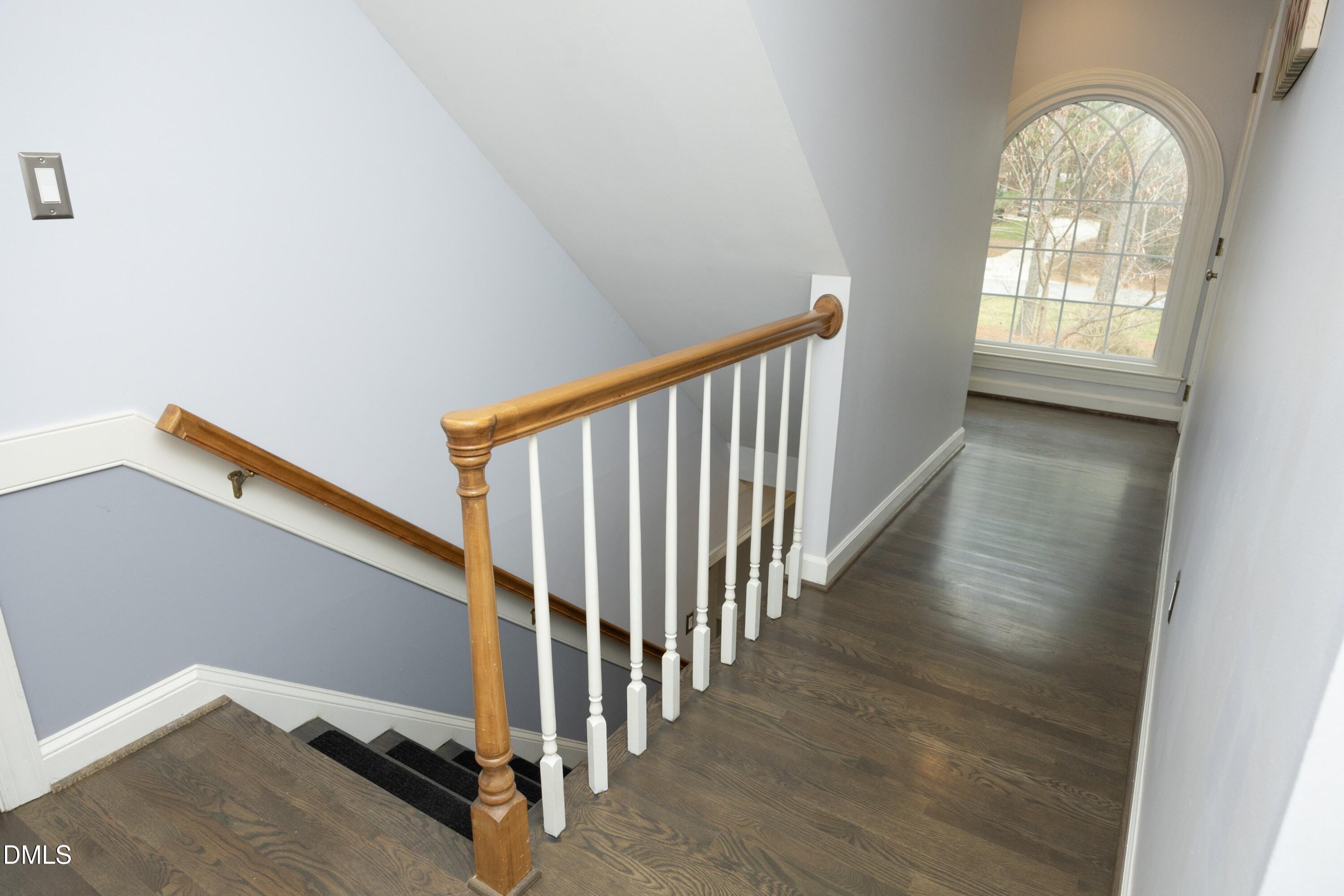 10728 Winding Wood Trail Raleigh, NC 27613 - Photo 18 of 54 a view of entryway with wooden floor