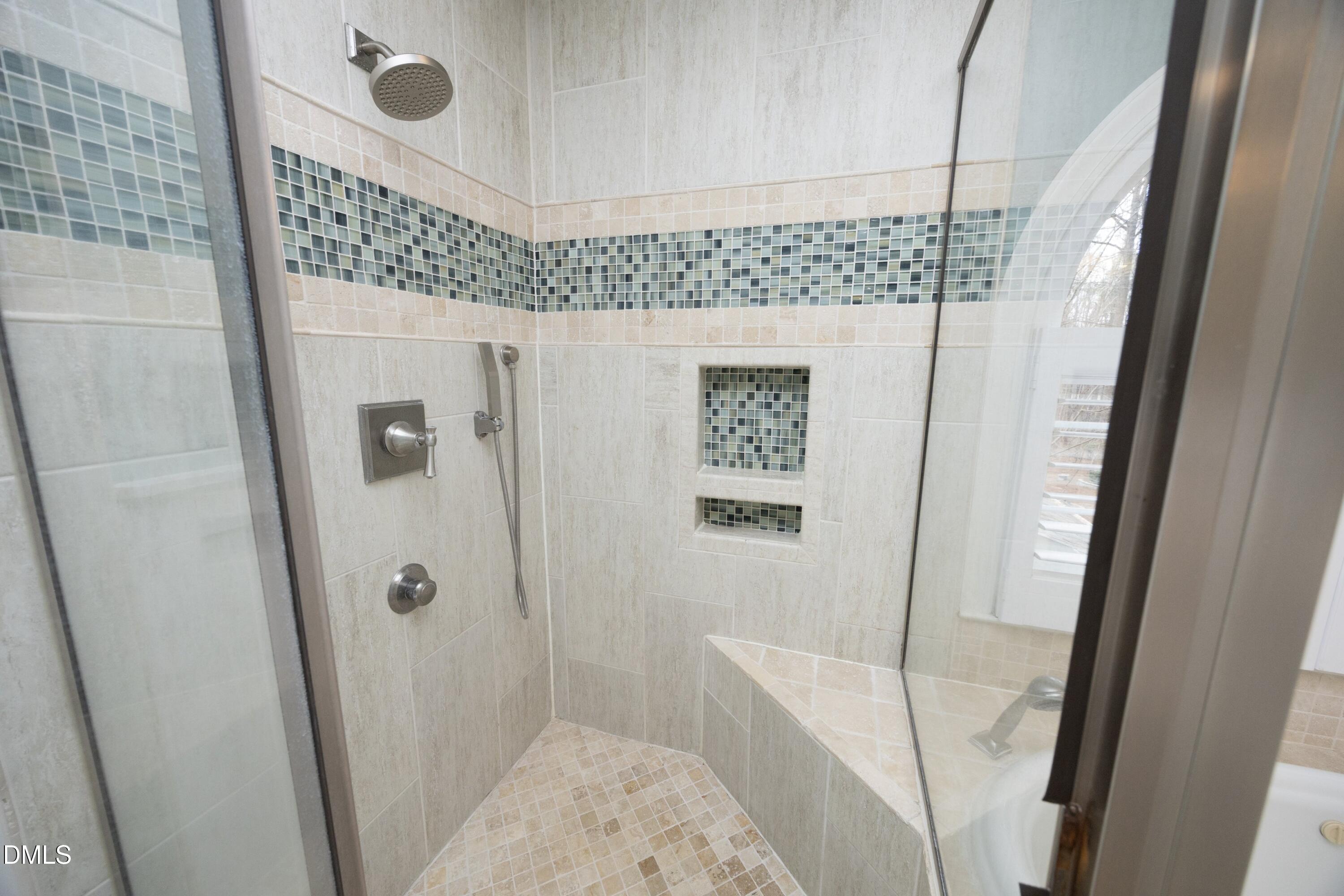 10728 Winding Wood Trail Raleigh, NC 27613 - Photo 23 of 54 a bathroom with a shower