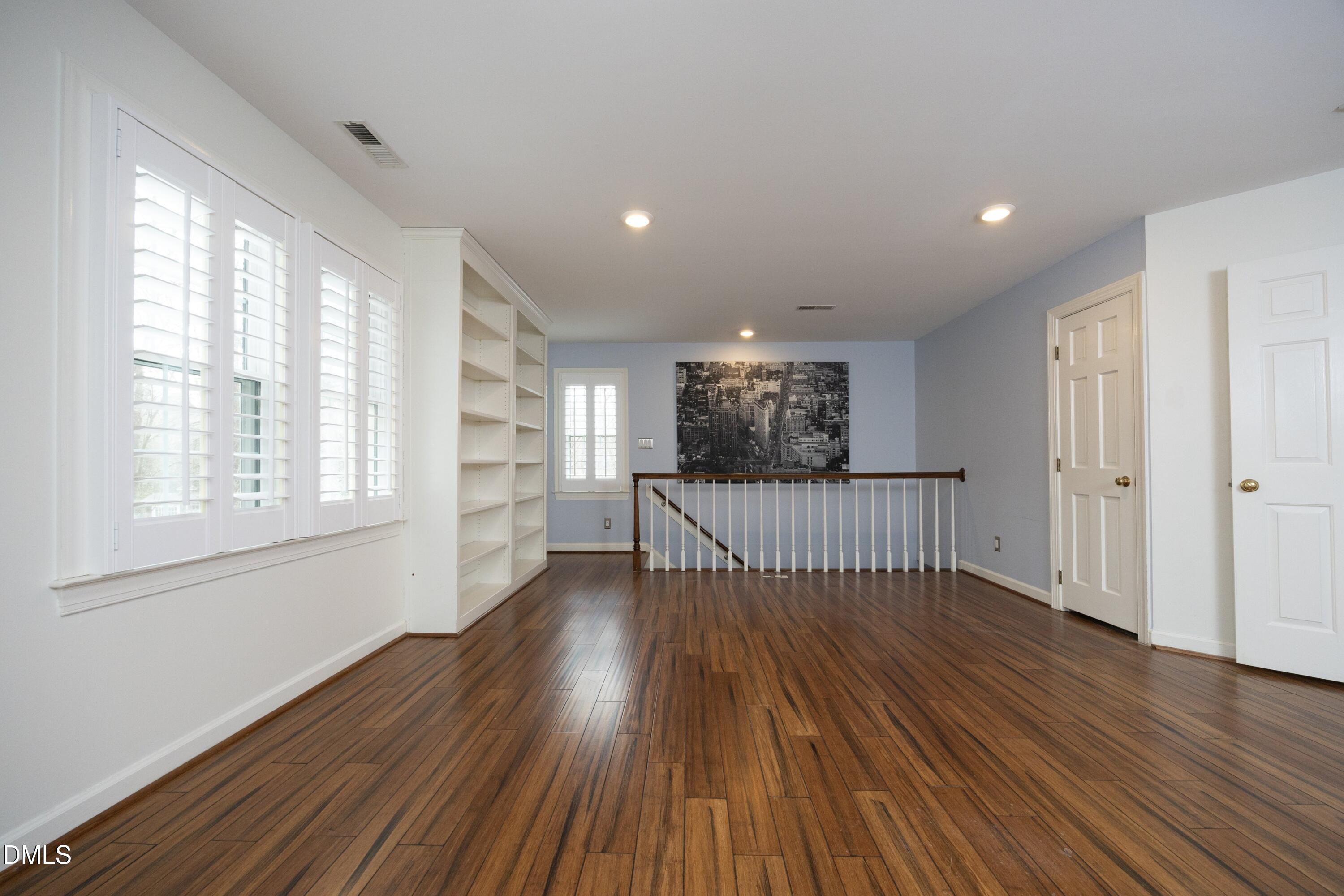 10728 Winding Wood Trail Raleigh, NC 27613 - Photo 28 of 54 a view of entryway with wooden floor and window