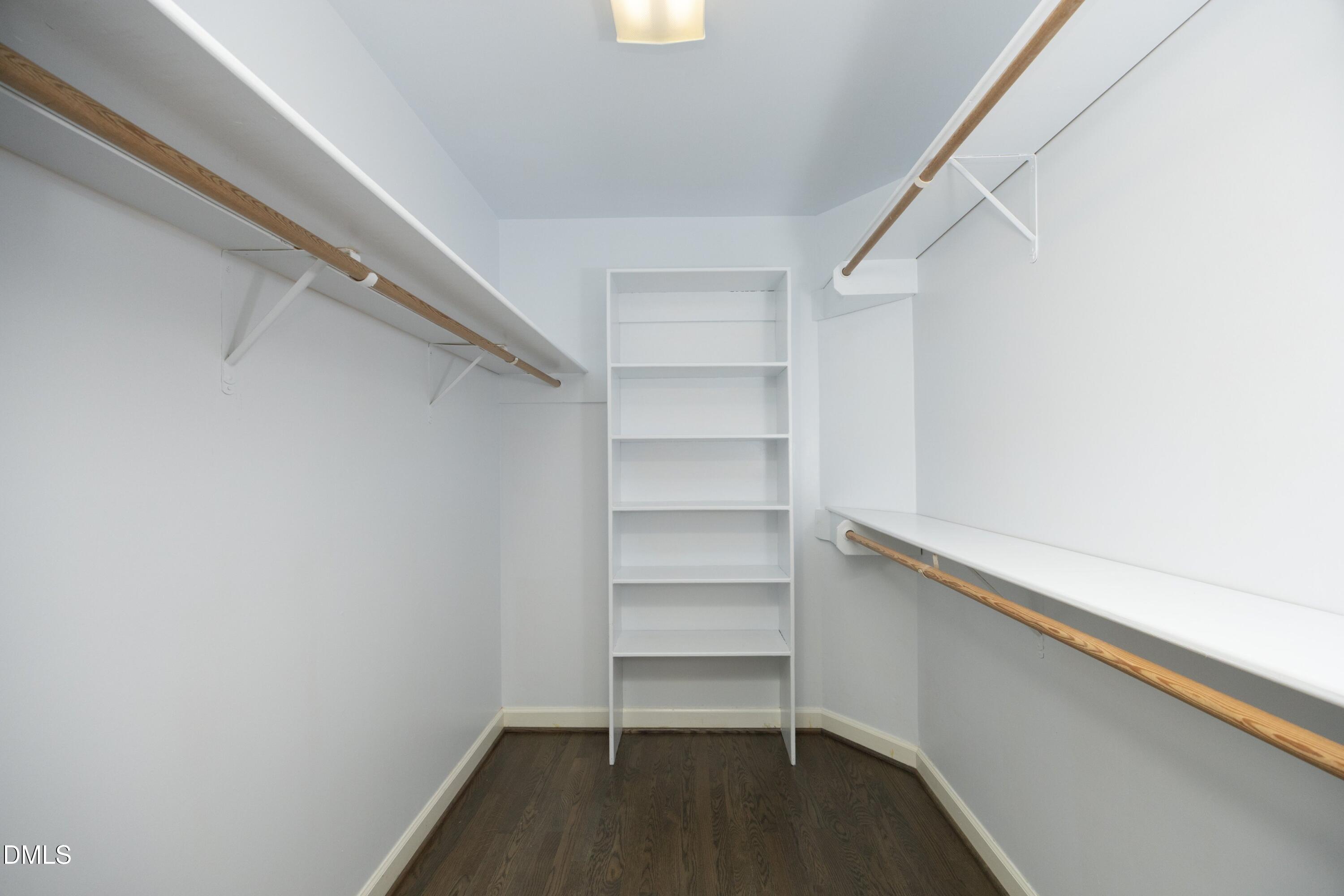 10728 Winding Wood Trail Raleigh, NC 27613 - Photo 31 of 54 a storage room with wooden floor