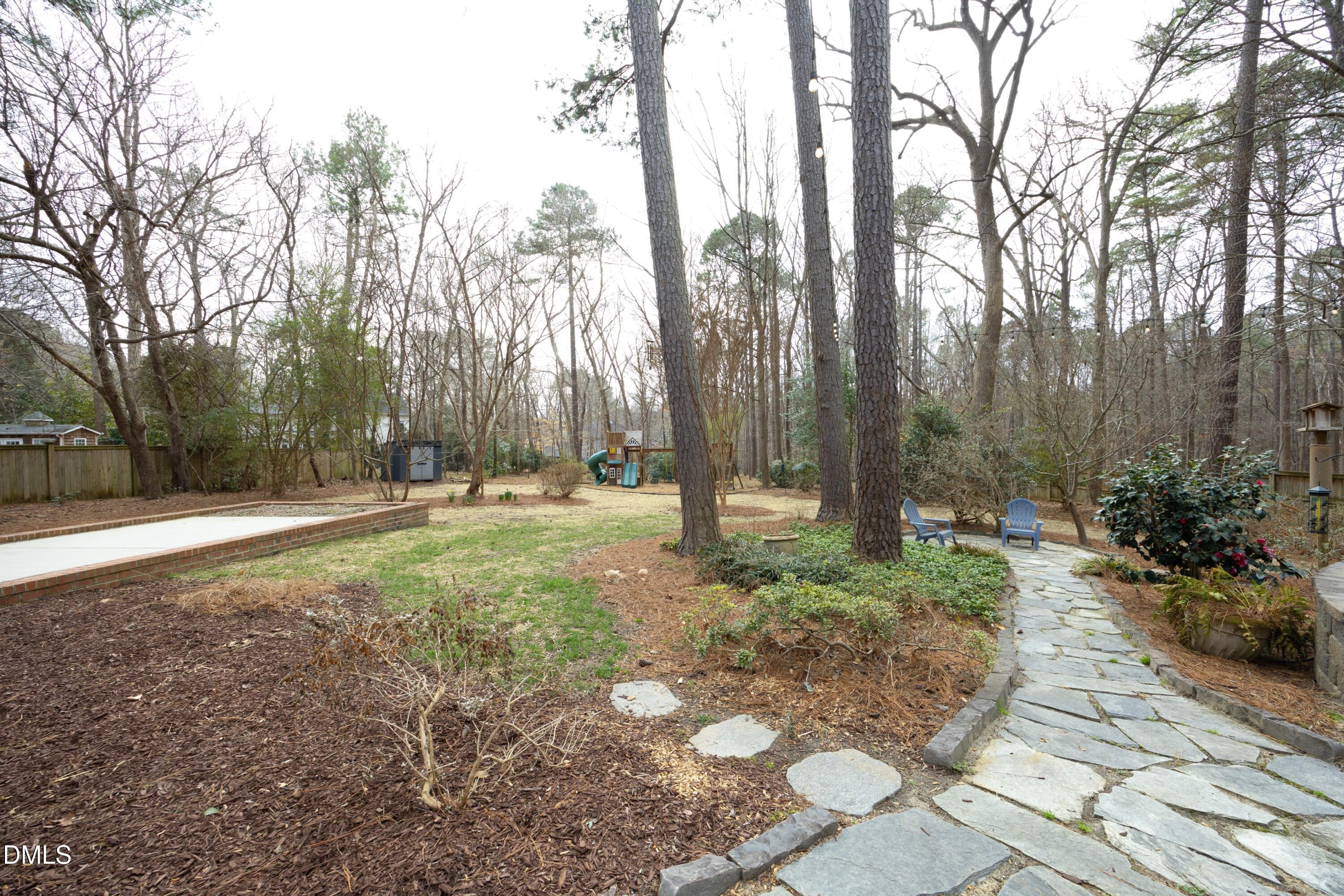 10728 Winding Wood Trail Raleigh, NC 27613 - Photo 37 of 54 a view of outdoor space with trees
