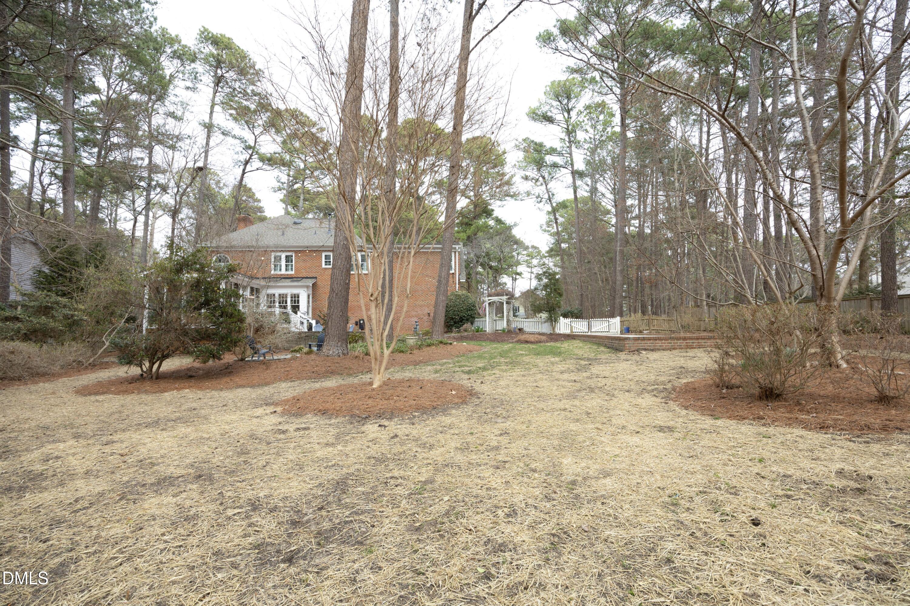10728 Winding Wood Trail Raleigh, NC 27613 - Photo 39 of 54 a view of yard with trees