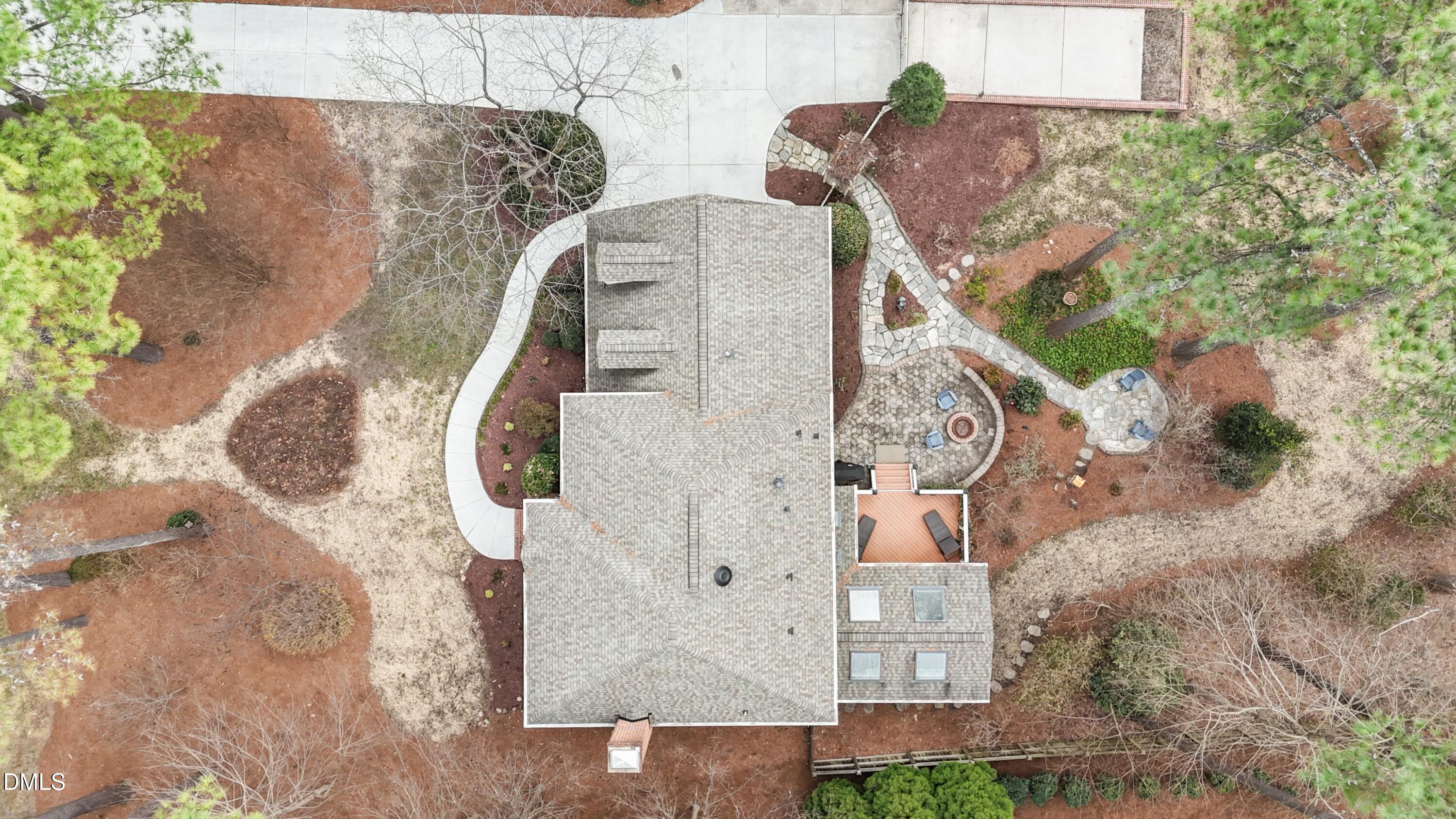 10728 Winding Wood Trail Raleigh, NC 27613 - Photo 49 of 54 an aerial view of a house with outdoor space and a lake view