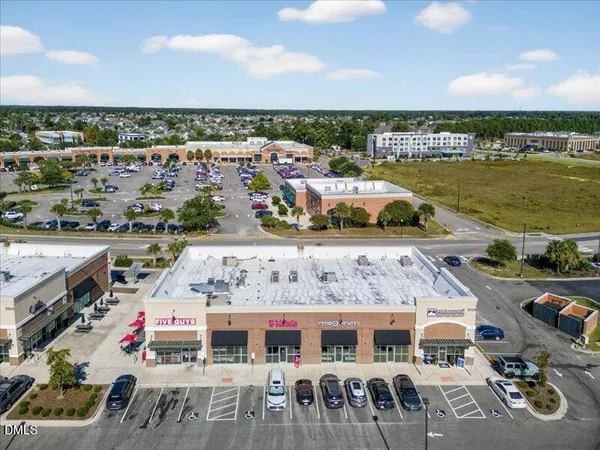 a view of city with ocean