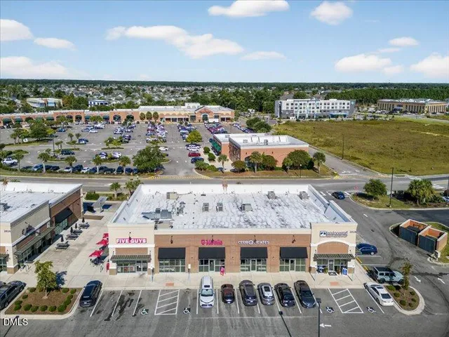 a view of city with ocean
