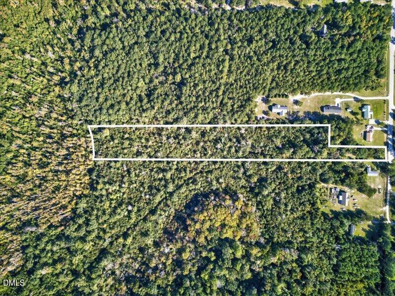 110 Hewett-Burton Road Southeast Leland, NC 28451 - Photo 5 of 27 a view of a yard