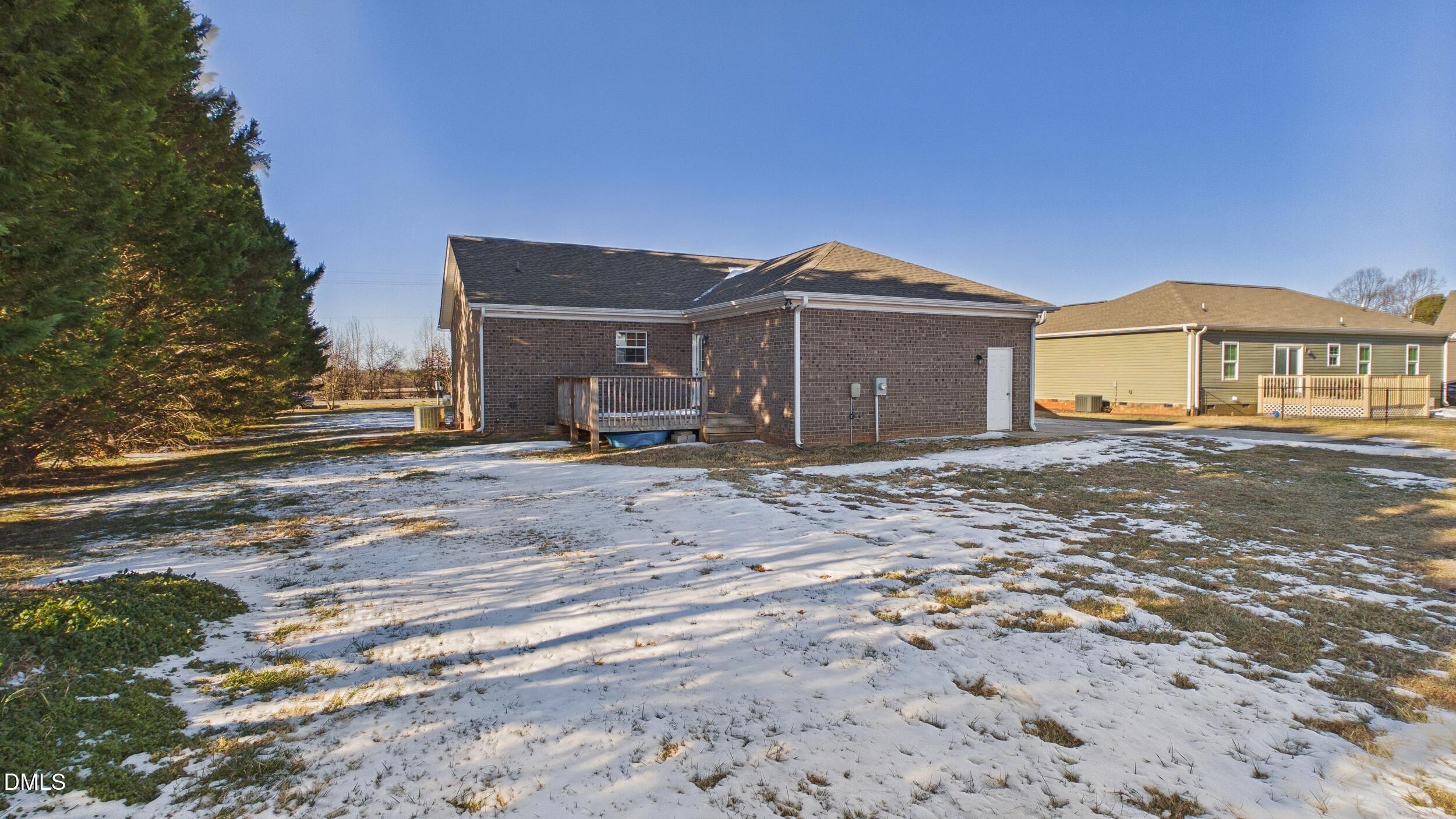 5930 Old 421 Road Liberty, NC 27298 - Photo 31 of 42 a front view of a house with a yard