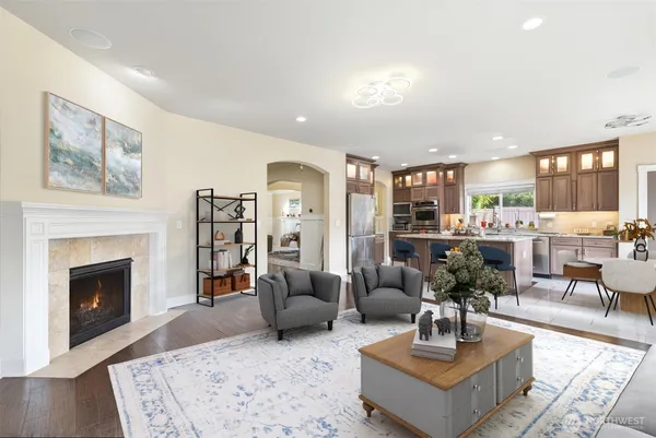 a bedroom with furniture and a flat screen tv
