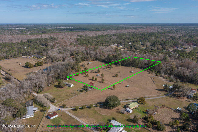 1895 Bennett Road St. Augustine, FL 32092 - Photo 16 of 17 an aerial view of a house with outdoor space