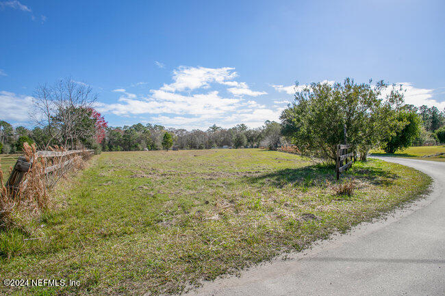 1895 Bennett Road St. Augustine, FL 32092 - Photo 5 of 17 a view of a yard with an trees