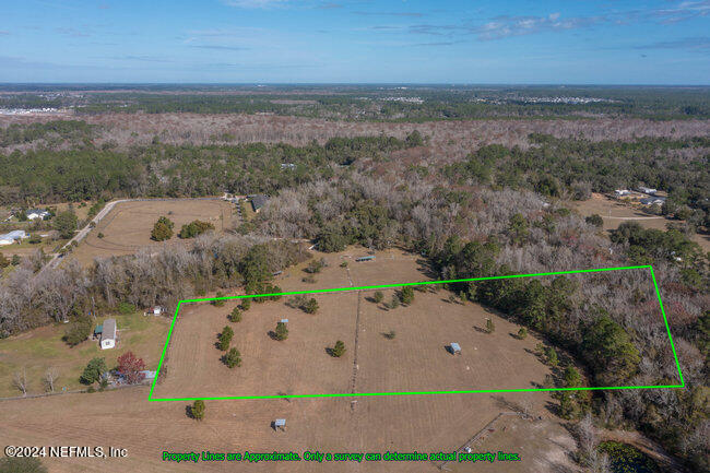 1895 Bennett Road St. Augustine, FL 32092 - Photo 8 of 17 an aerial view of a house with a yard
