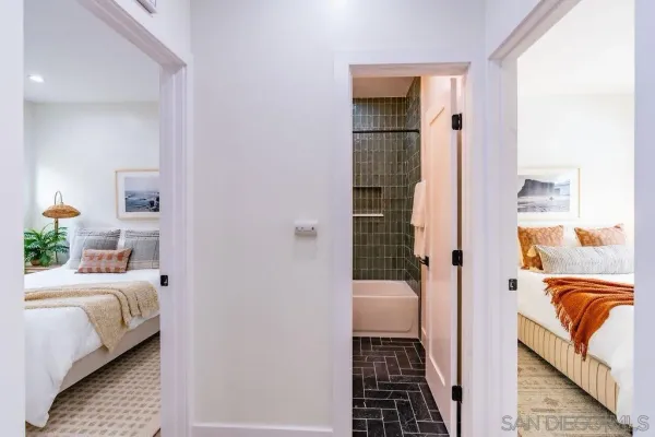 a bedroom with a bed and a walk in closet