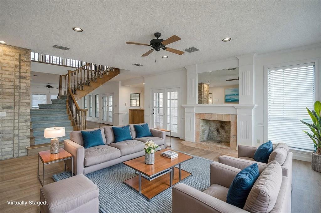 3017 Freeman Lane Crowley, TX 76036 - Photo 11 of 39 a living room with furniture and a fireplace
