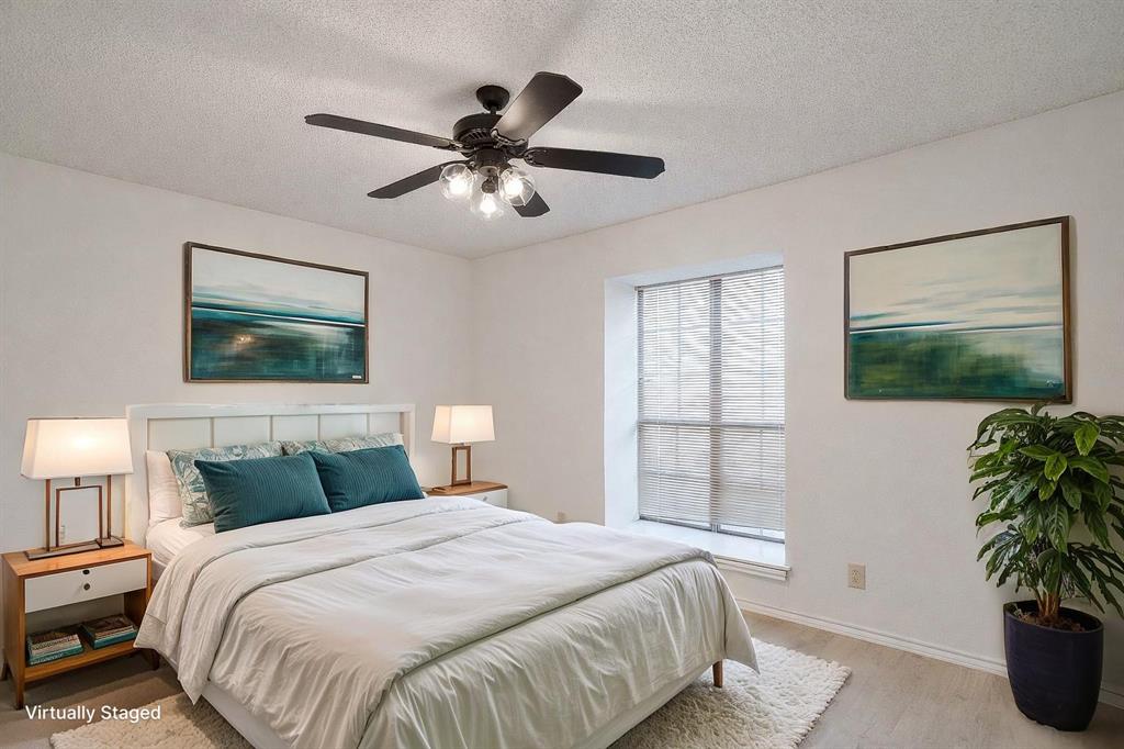 3017 Freeman Lane Crowley, TX 76036 - Photo 29 of 39 a bedroom with a bed and a potted plant