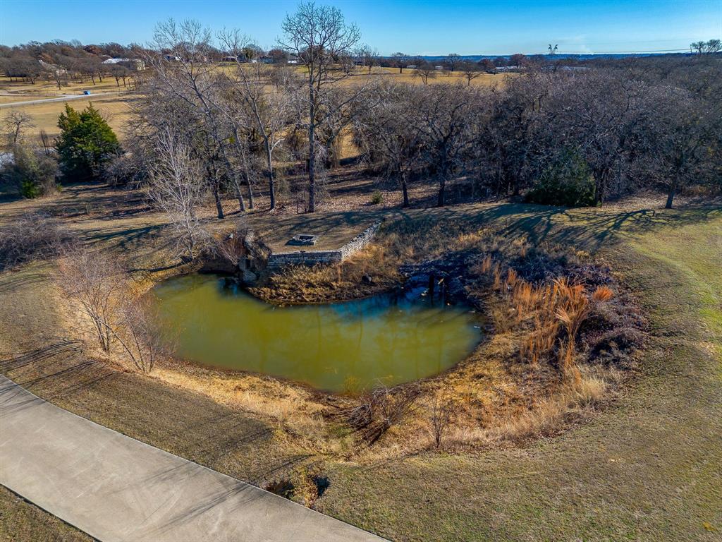 3017 Freeman Lane Crowley, TX 76036 - Photo 8 of 39 a view of a swimming pool with a yard