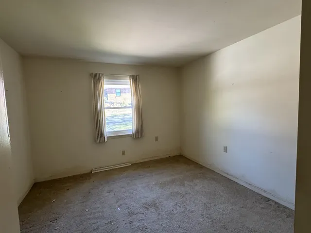 an empty room with a window