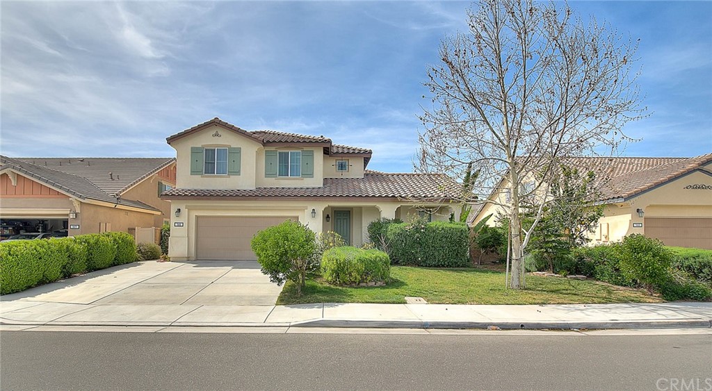 front view of a house with a street