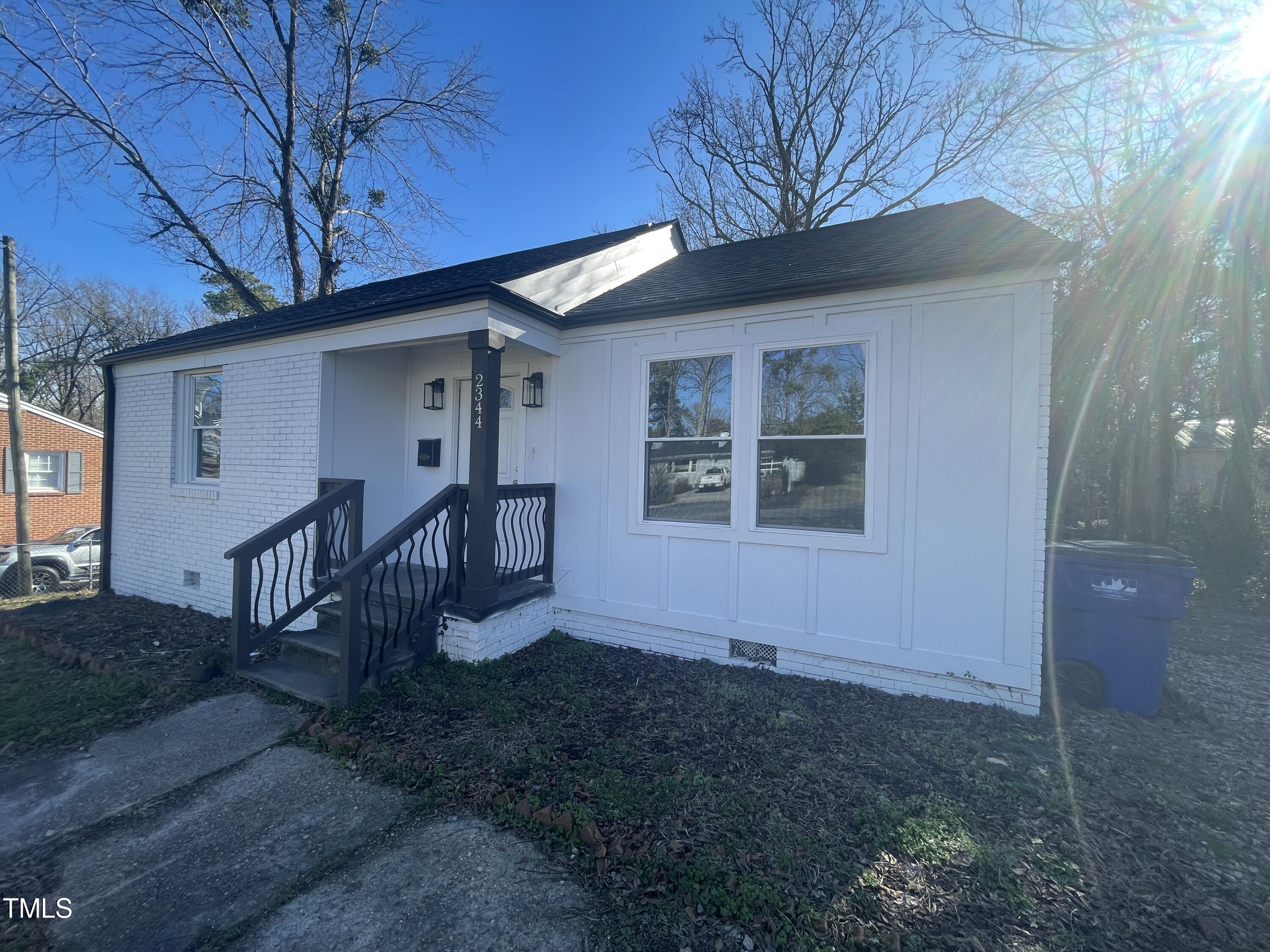 2344 Stevens Road Raleigh, NC 27610 - Photo 1 of 3 a view of a house with a yard
