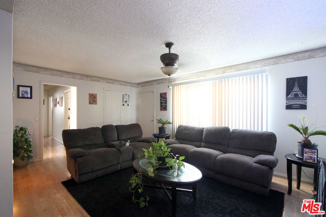 8820 Holly Lane Riverside, CA 92503 - Photo 12 of 20 a living room with furniture and a large window