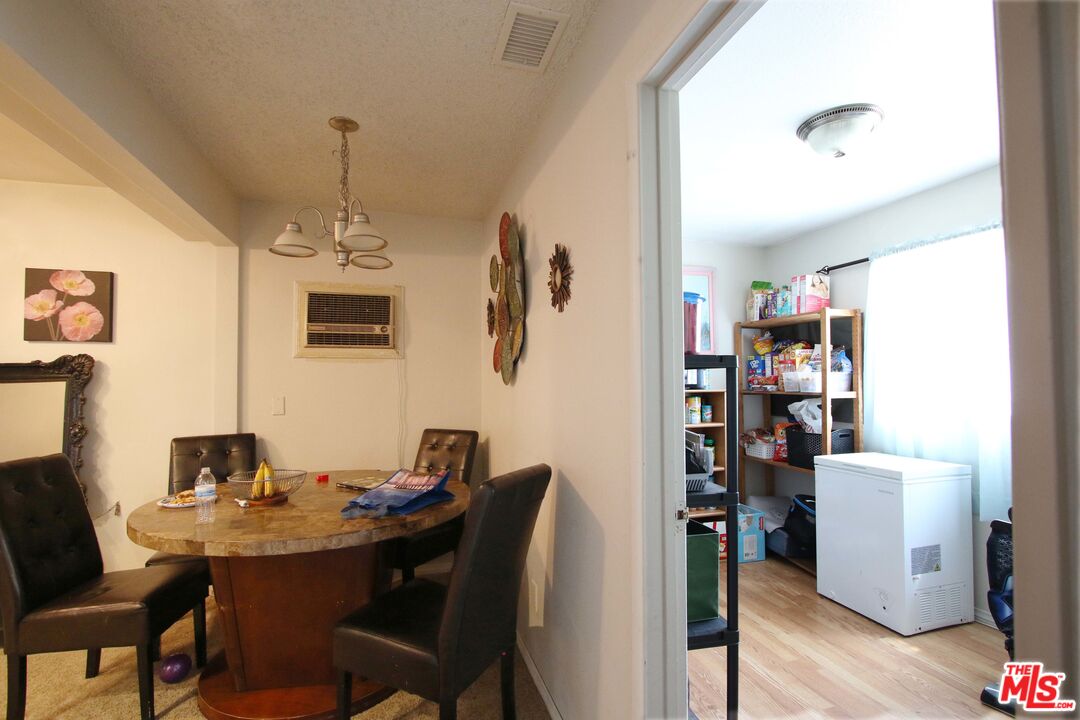 8820 Holly Lane Riverside, CA 92503 - Photo 14 of 20 a view of a dining room with furniture