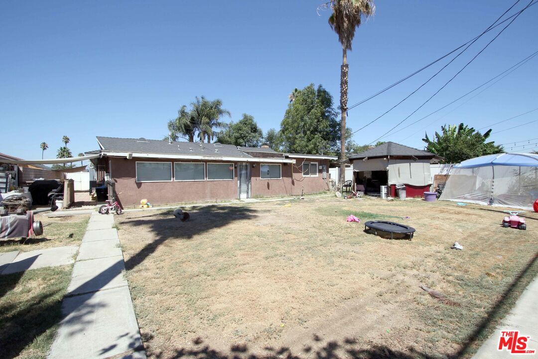 8820 Holly Lane Riverside, CA 92503 - Photo 10 of 20 a view of a swimming pool with a patio