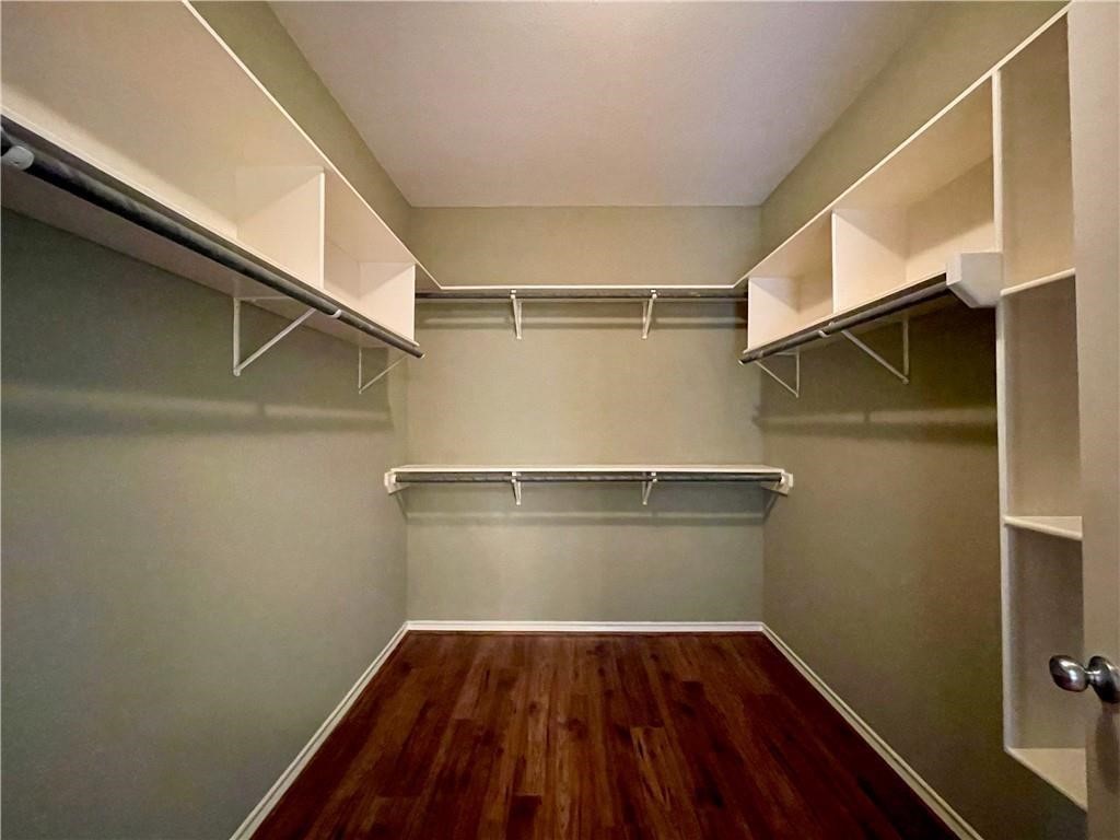 7505 Bell Isle Corpus Christi, TX 78414 - Photo 19 of 24 a view of walk in closet with empty racks