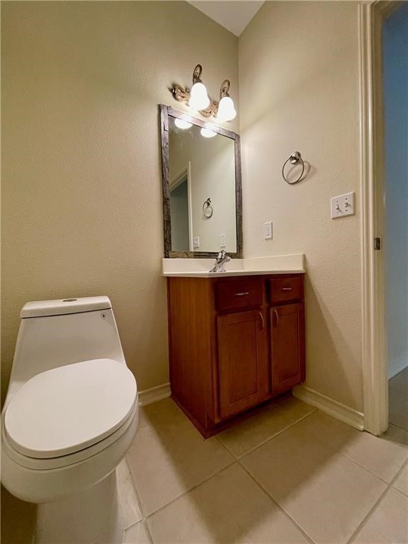 7505 Bell Isle Corpus Christi, TX 78414 - Photo 23 of 24 a bathroom with a toilet sink and mirror