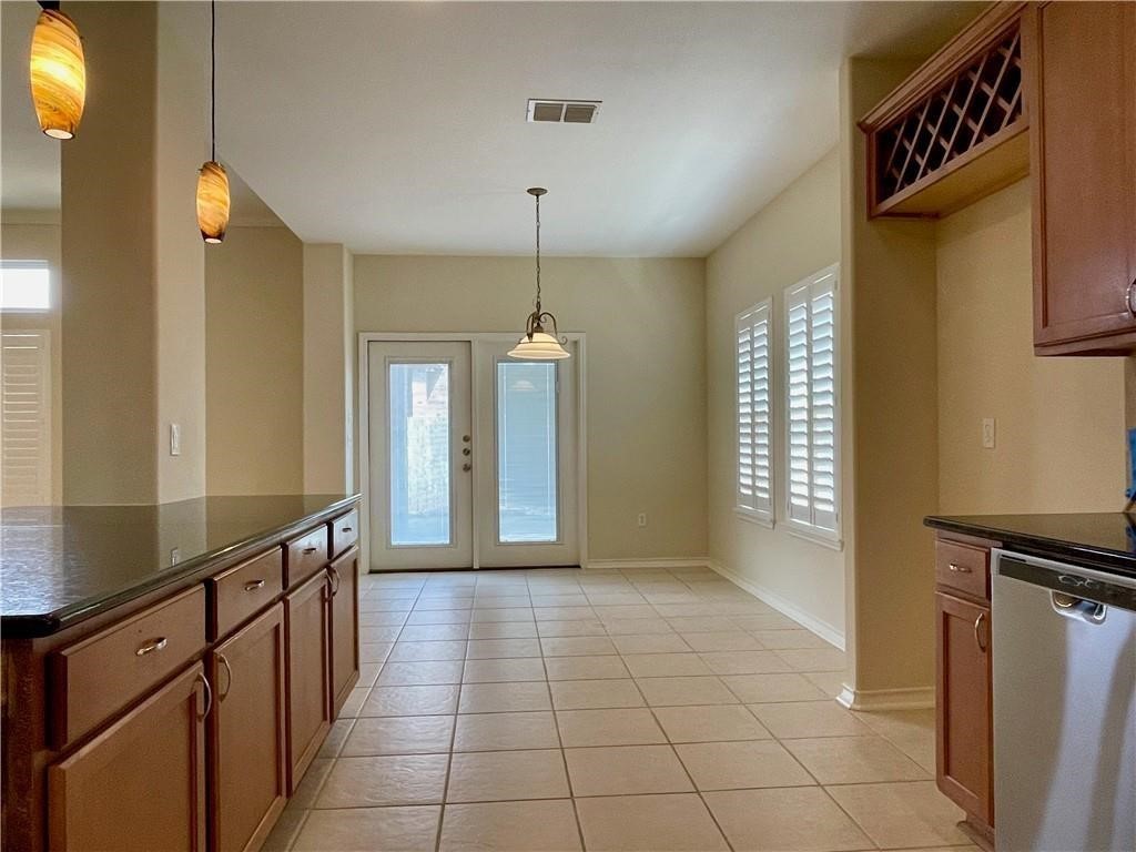 7505 Bell Isle Corpus Christi, TX 78414 - Photo 7 of 24 a view of a hallway with windows