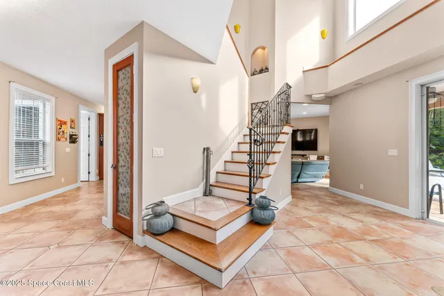 a view of swimming pool with a patio