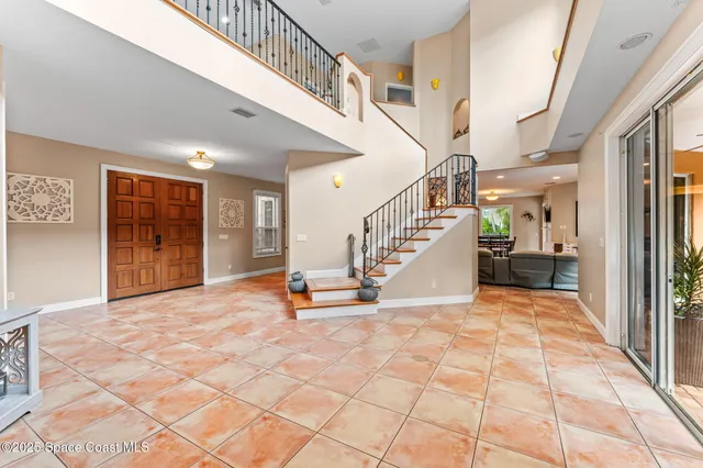 a view of livingroom with furniture and workspace