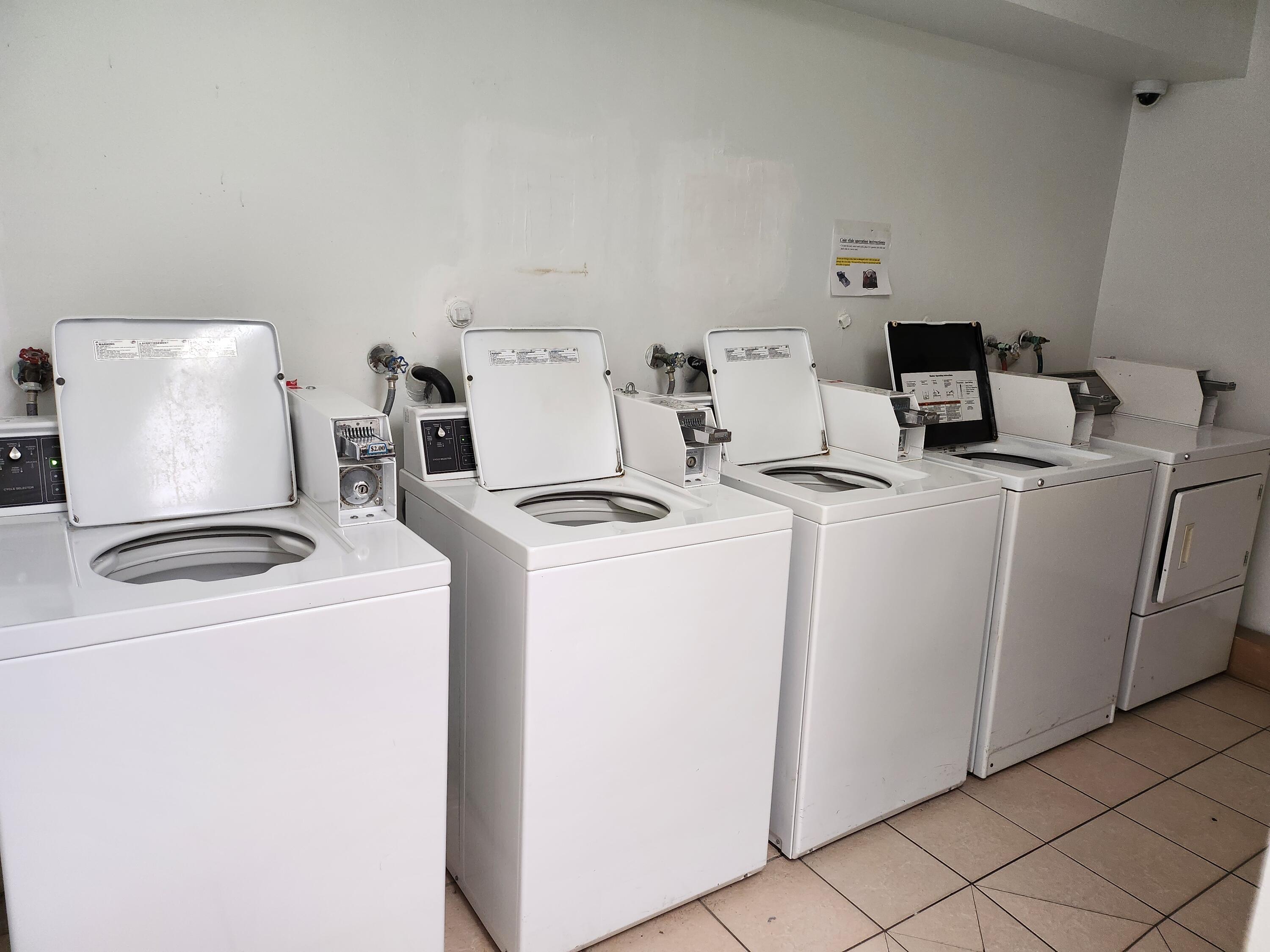 450 Northwest 20th Street, Unit 3040 Boca Raton, FL 33431 - Photo 31 of 34 Laundry Room 1st Floor